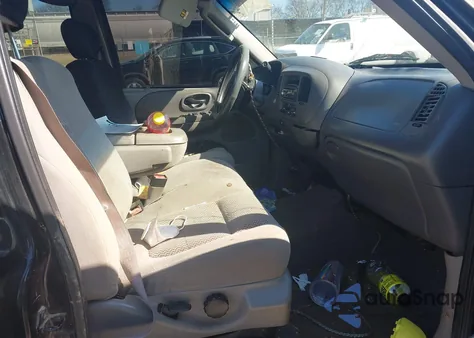 2002 Ford F-150 Lariat/Xlt z USA, uszkodzony, nr VIN 1FTRW07L02KD04880